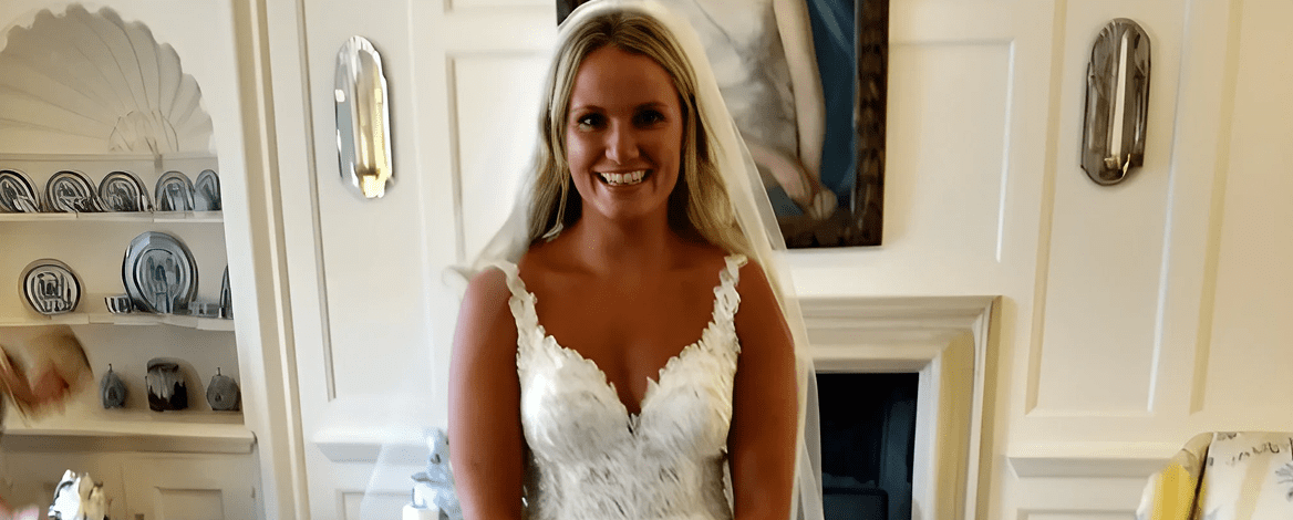 Bride posing indoors with veil