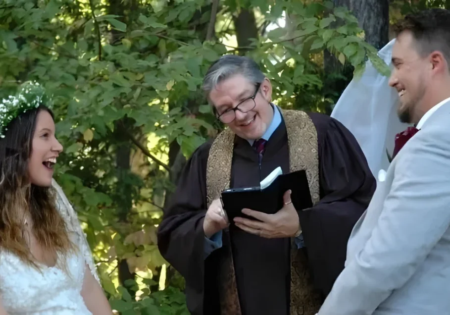 Couple exchanging vows outdoors